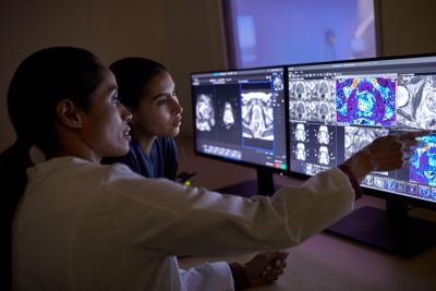 Clinician reviewing prostate MRI on Philips advanced visualization workstation in radiology