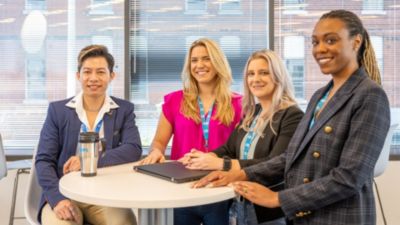 Philips employees working together in an office environment