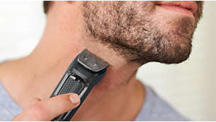 El recortador metálico recorta la barba, el cabello y el vello del cuerpo