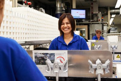 Philips factory workers assembling healthcare equipment on a production line