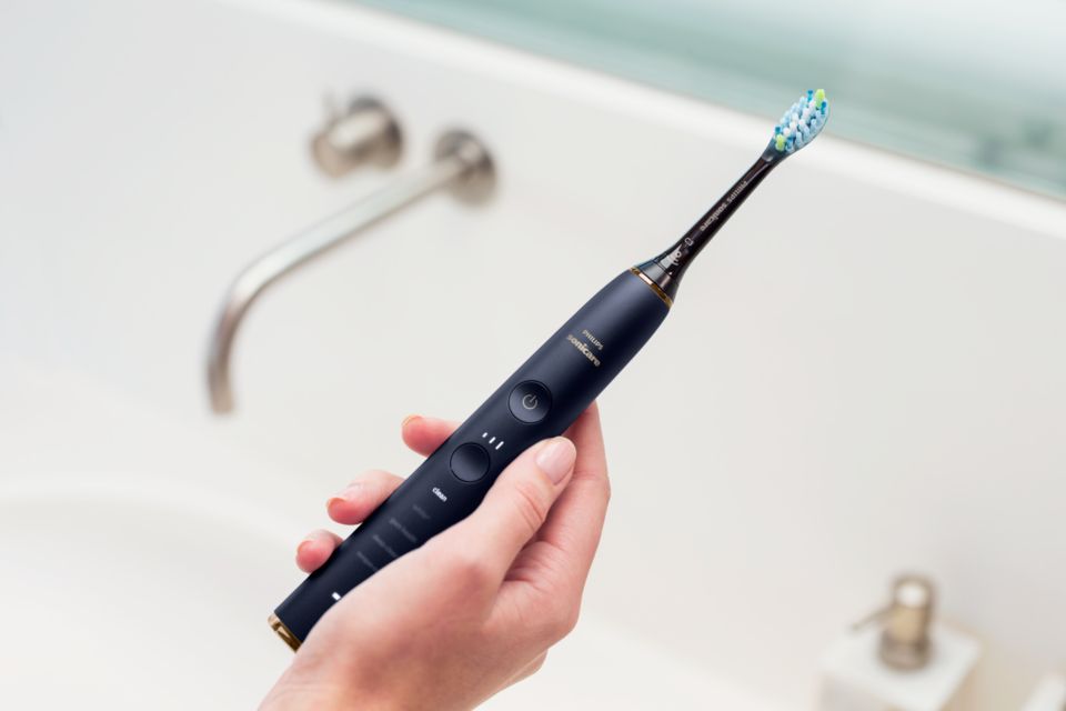 Sonic electric toothbrush with app