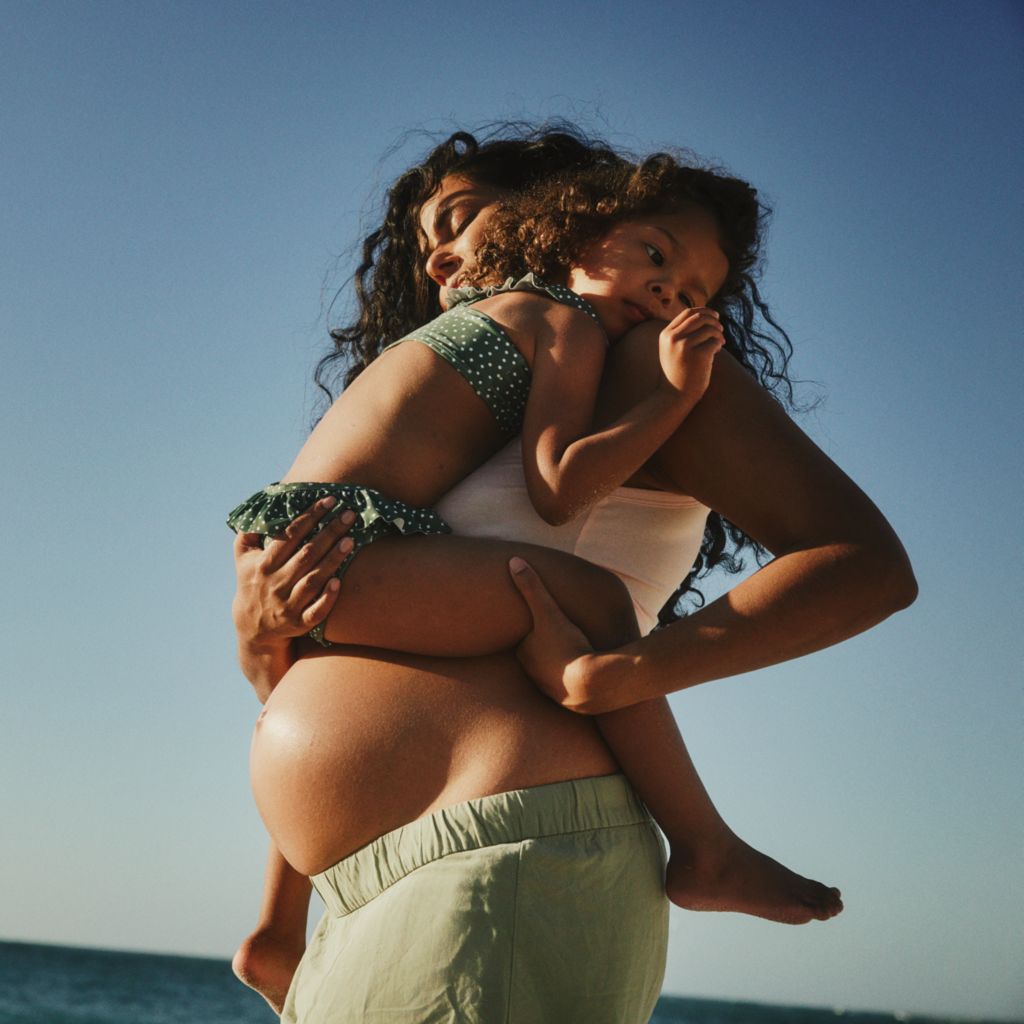 women with toddler in rural setting