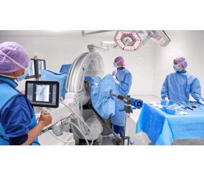 Surgical team performing orthopedic case with Zenition FD mobile C-arm