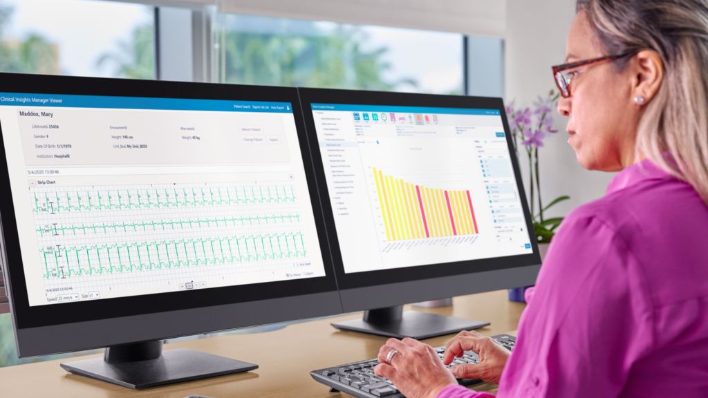 Female researcher reviewing CIM Viewer and AIM Viewer