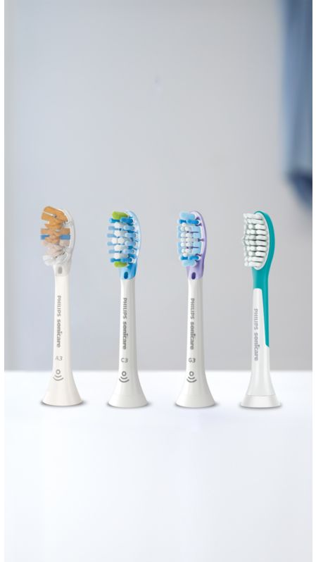 Têtes de brosse Philips Sonicare disposées sur un plan de travail