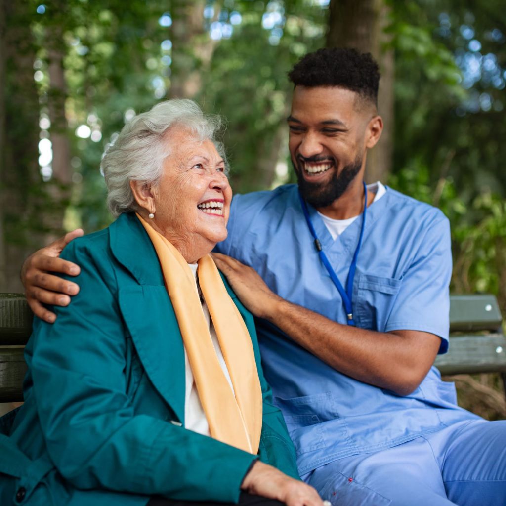 Physician speaking with patient outside