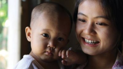 Baby Holding Mother's Shoulder
