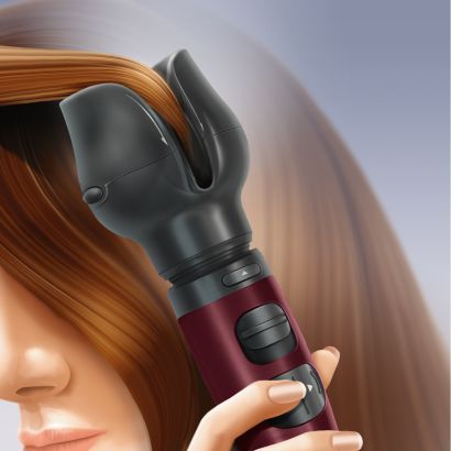 Style bouclé ou lisse avec le boucleur soufflant