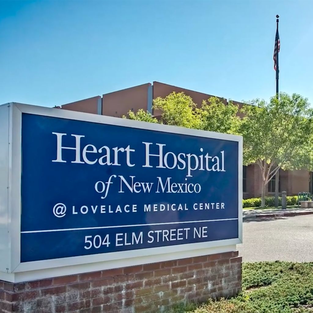 Exterior photo of the Heart Hospital of New Mexico sign and building