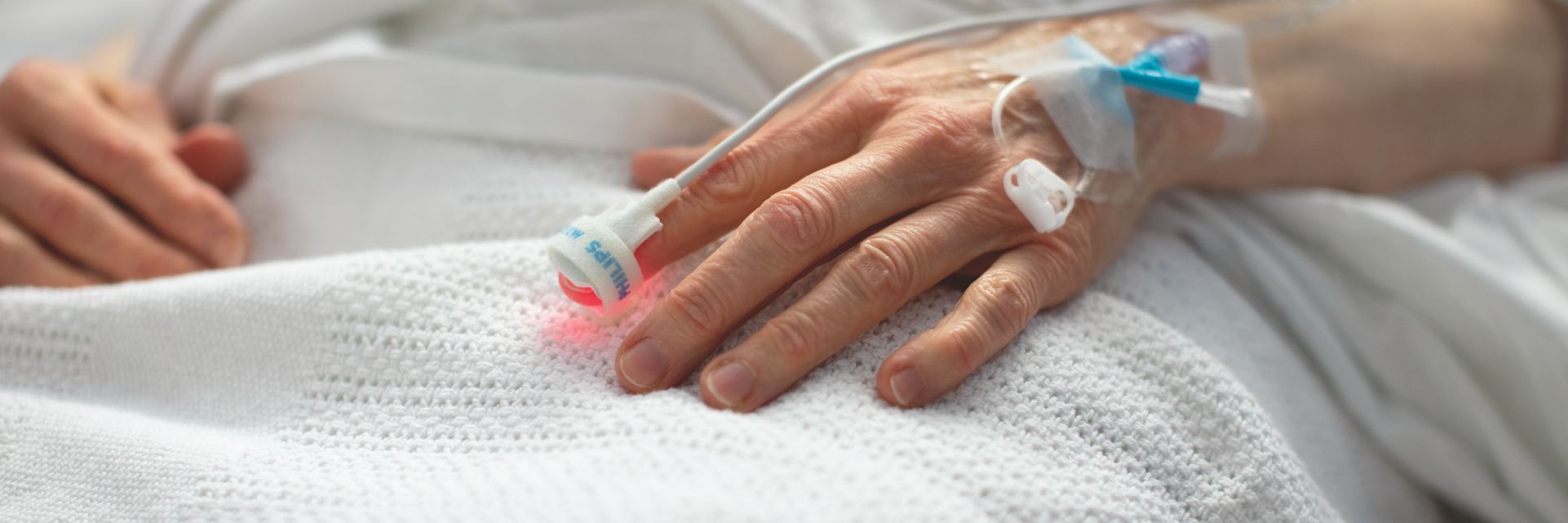 Patient with SpO2 wrap sensor