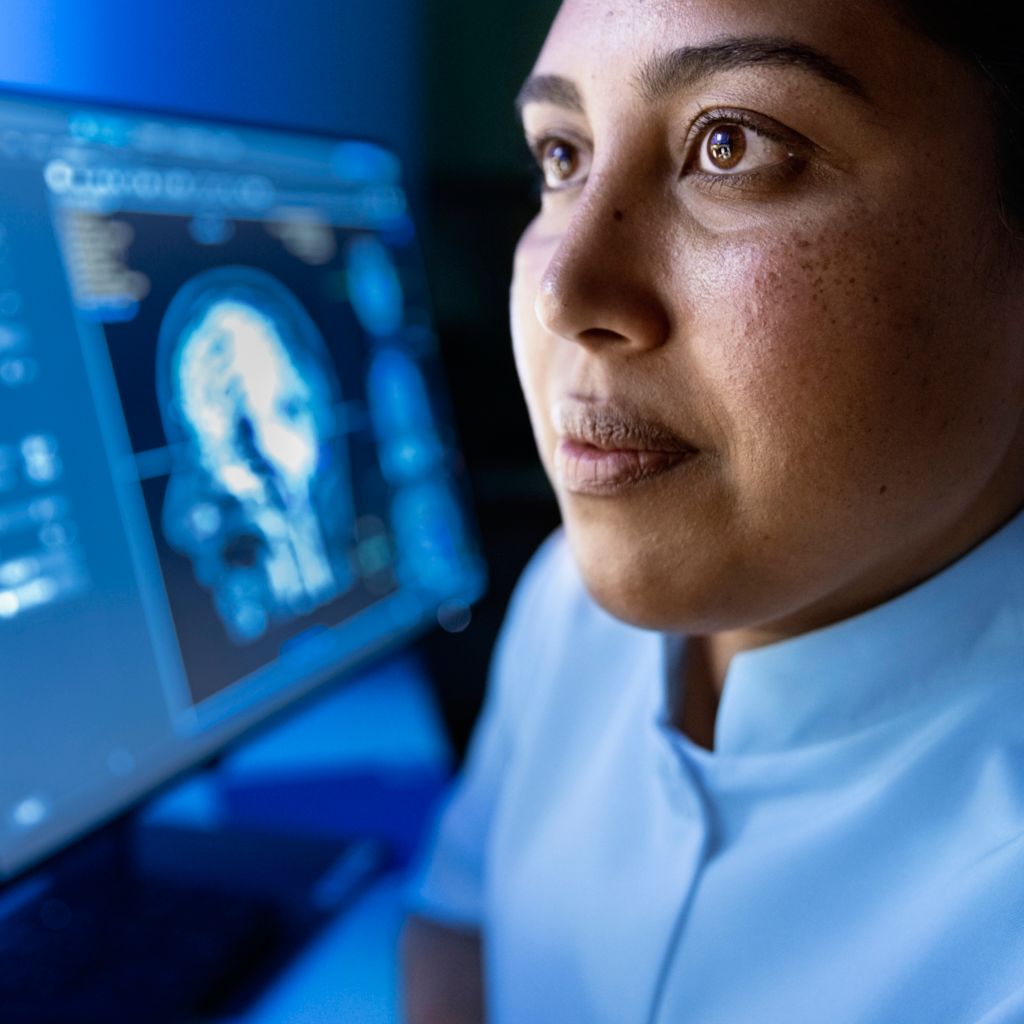radiologist looking at screen