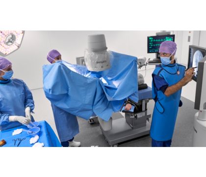 Surgical team performing urology case with Zenition II mobile C-arm