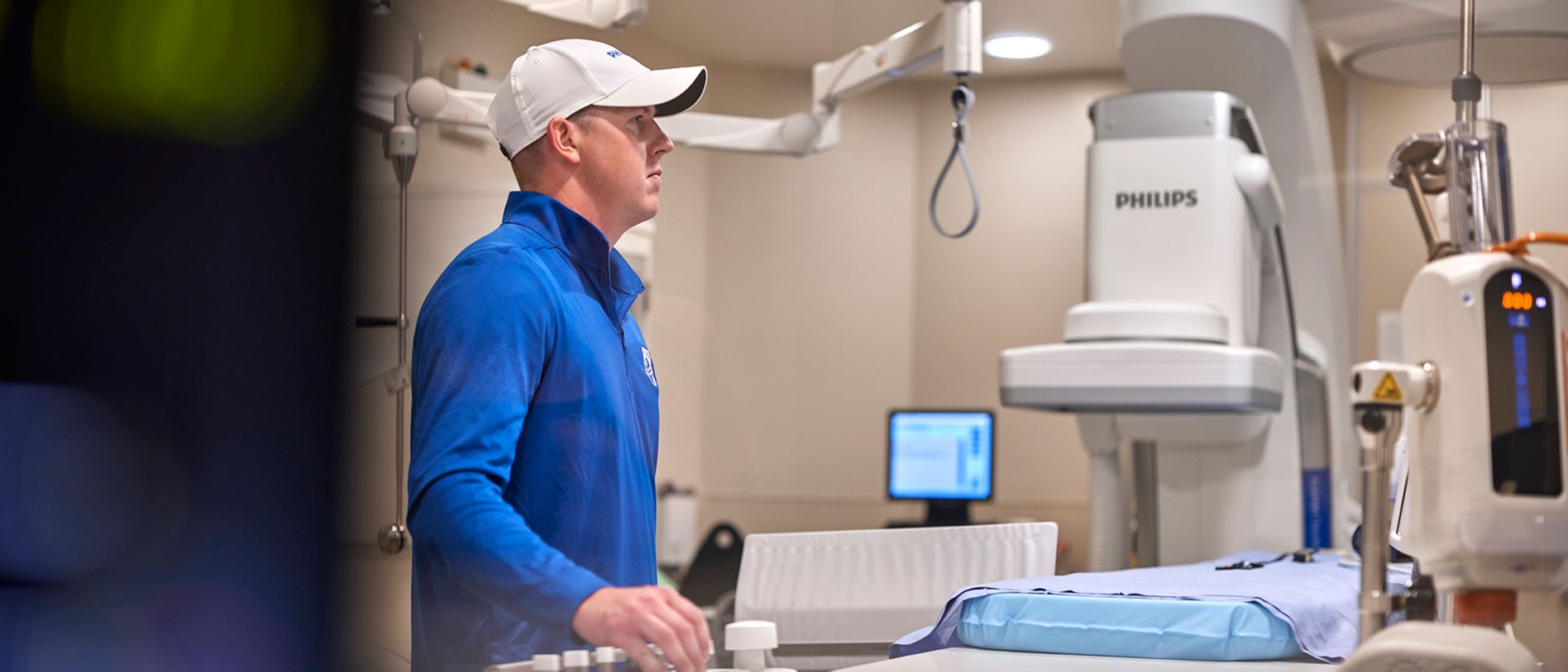 Philips service provider working with a c-arm machine