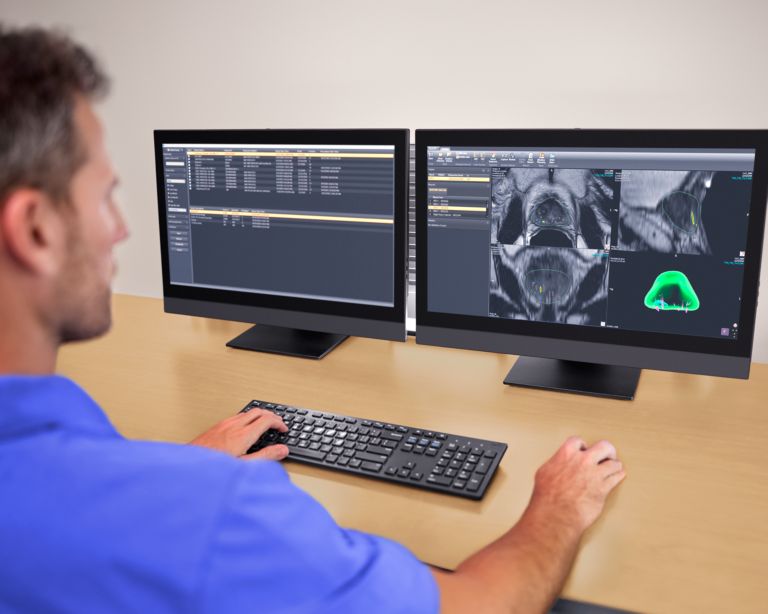 Clinician reviewing scans