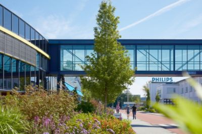 Exterior view of Philips Drachten office with walkway and glass skybridge