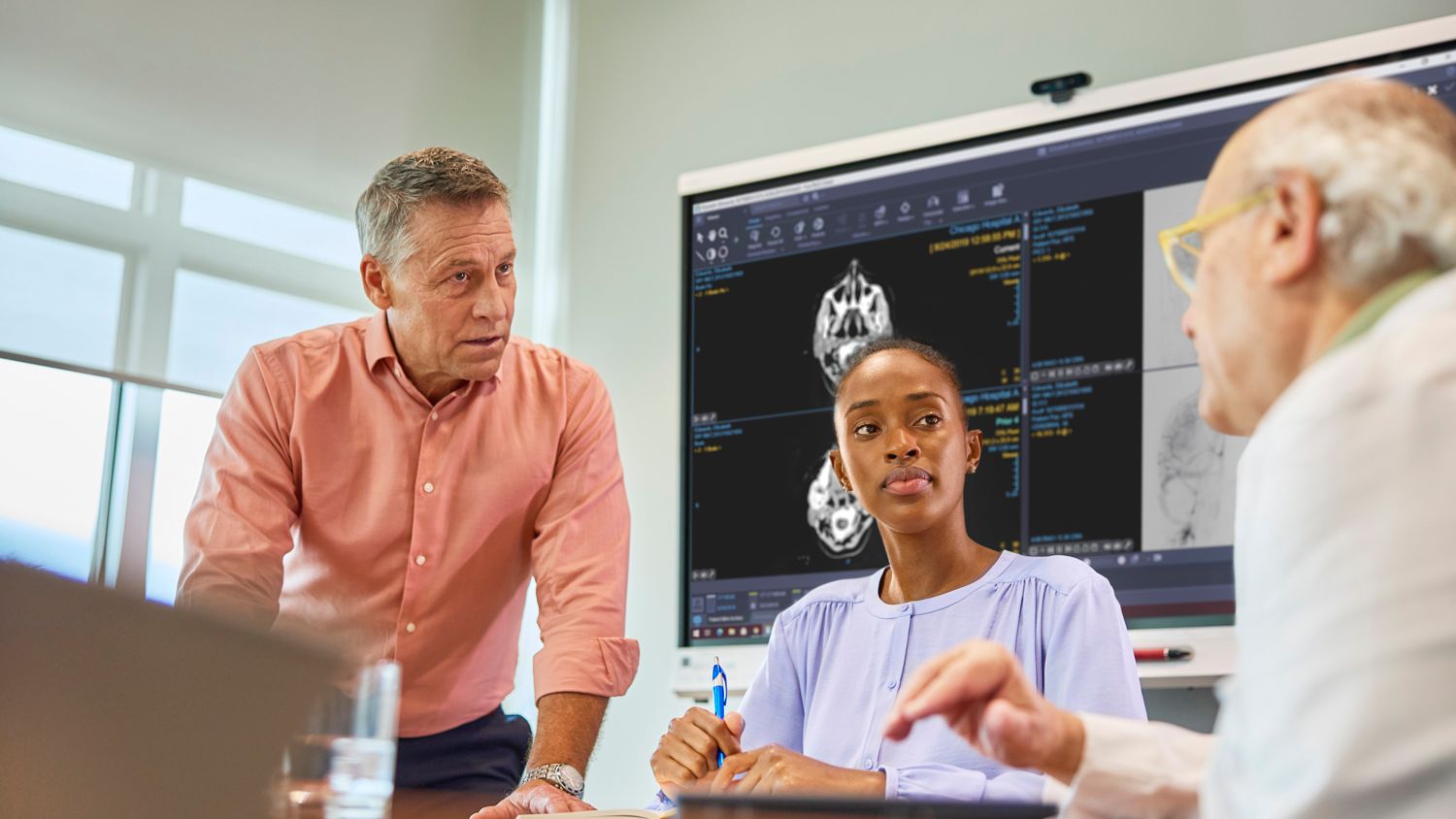 Conference room setting with web diagnostic viewer on screen