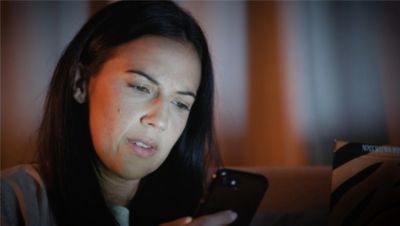 Woman looking at phone 