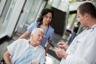 Patient in wheelchair with wearable