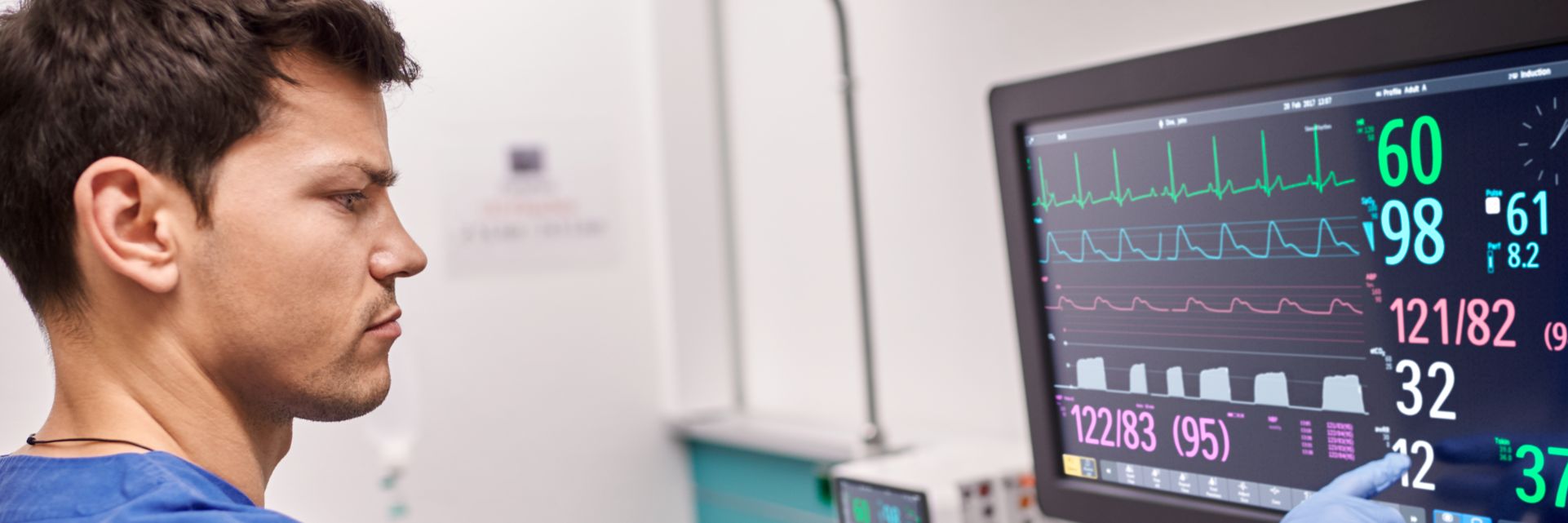 Man with Philips Central Monitoring Unit