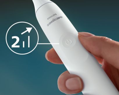 Closeup of hand holding a Sonicare 2300 handle