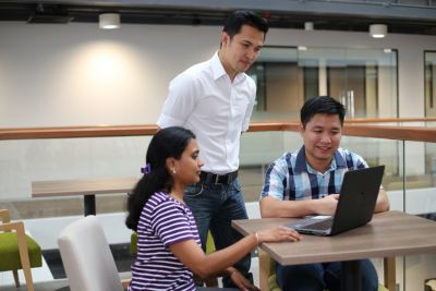 Team Meeting with Laptop