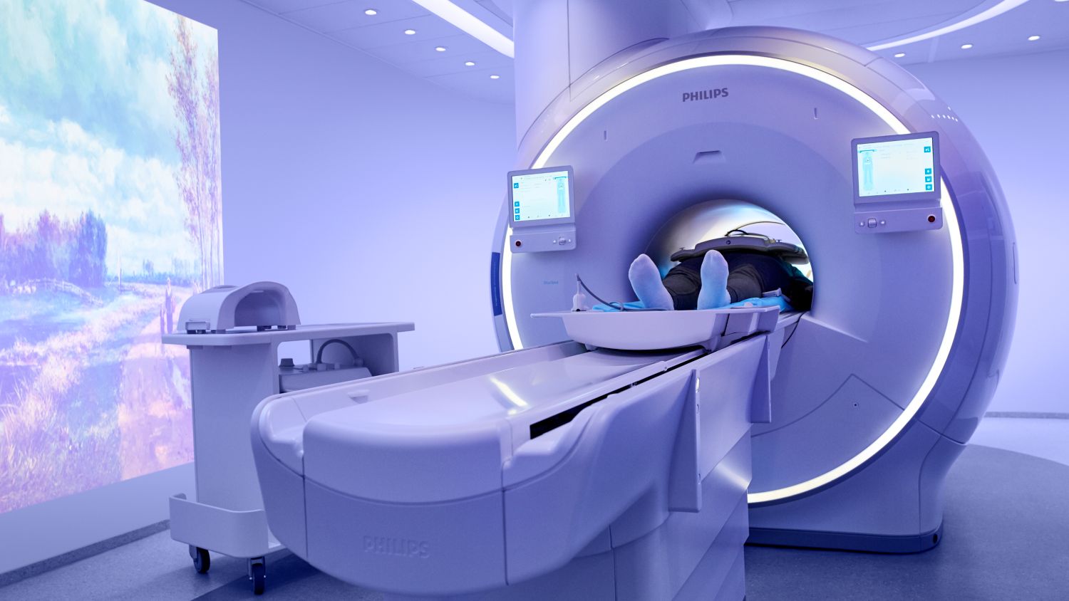 Patient being scanned for a cardiac exam on Ingenia Ambition