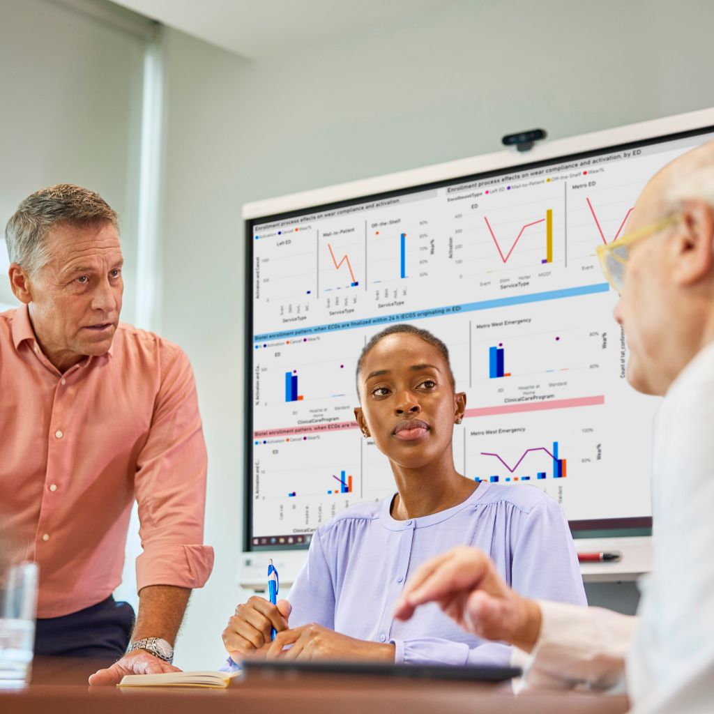 A healthcare team discusses their next move based on the ECG data and trends revealed by Enterprise Insights