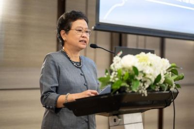 Woman Speaking at Podium