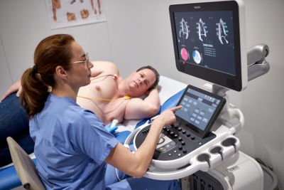 Sonographer using Affiniti CVx for strain measurement with AutoStrain LV for male patient