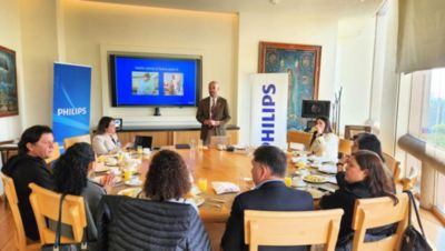 Philips team attending healthcare innovation meeting with presentation screen in Mexico