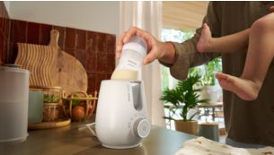 Warm bottles in 3 minutes with one button*