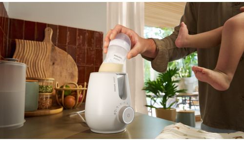 Warm bottles in 3 minutes with one button*