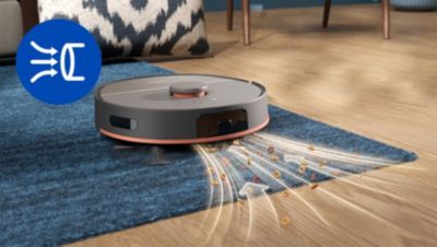 Robot vacuum cleaning rug edge with airflow illustration