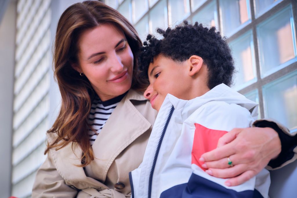 Mother and son in the waiting room prior to an MRI exam