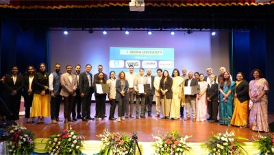 Philips Indira University and MIT ADT University representatives on stage during mou signing ceremony in Pune
