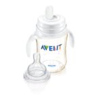 Baby's first step to using a cup