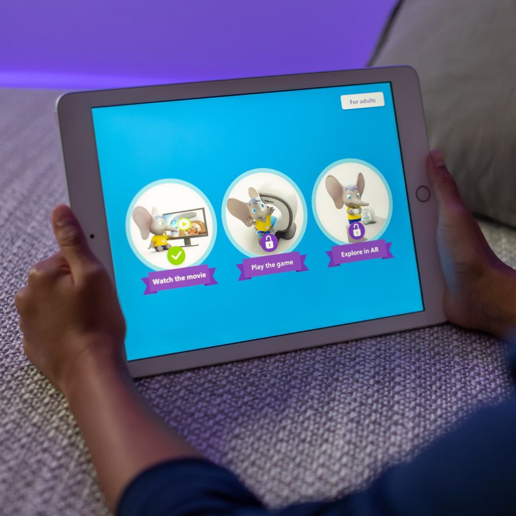 Child playing with the Scan Buddy app at home