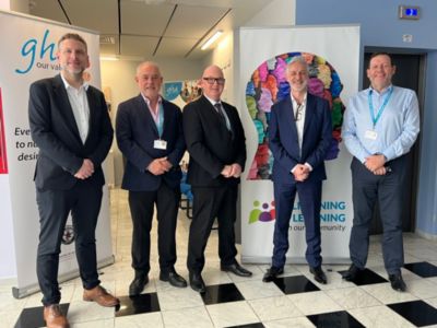 Philips and Gibraltar Health Authority team members standing together at GHA facility