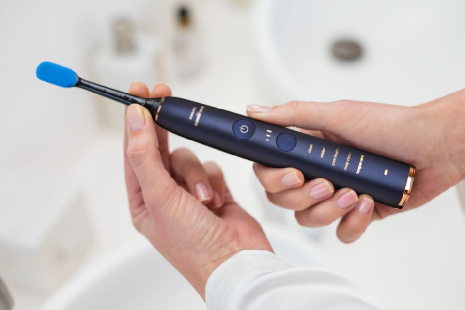 Sonic electric toothbrush with app