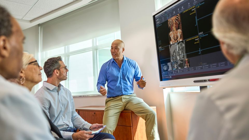 Conference room setting with web diagnostic viewer on screen