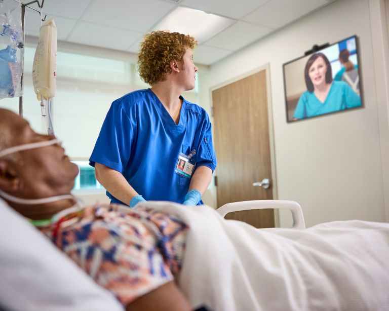 Nurse looking at screen 