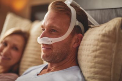 CPAP Patient awake in bed with mask on