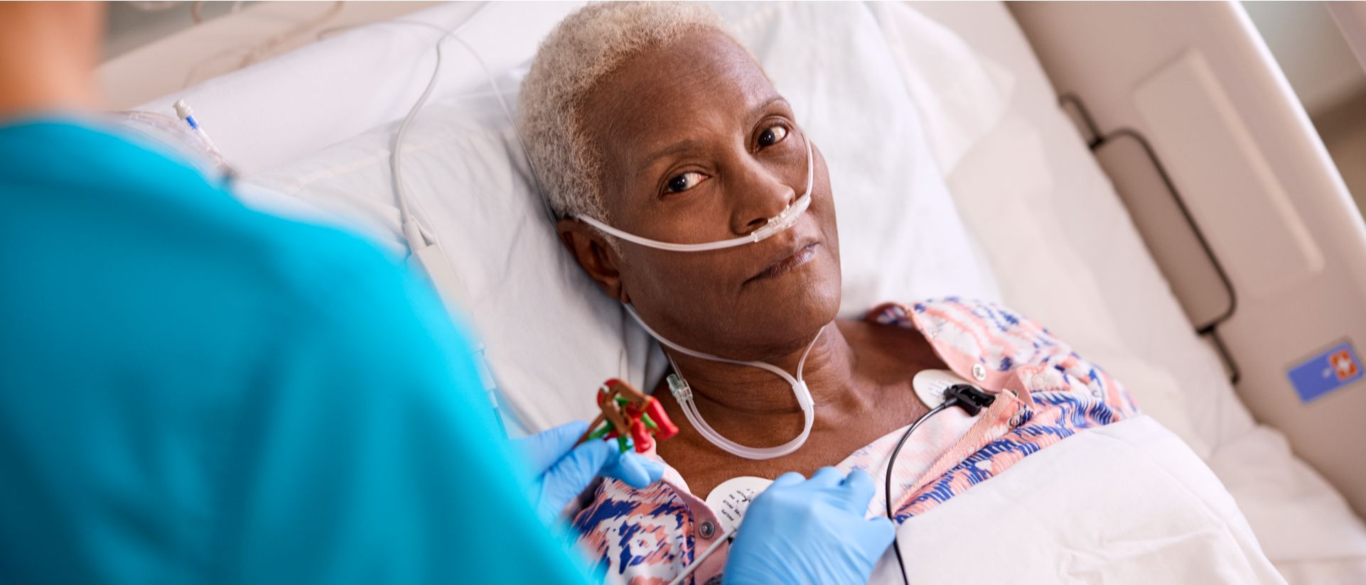 Patient getting ECG leads connected