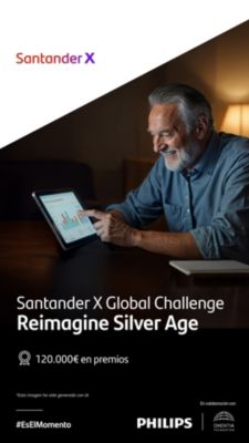 Older man using a tablet to review digital data at home