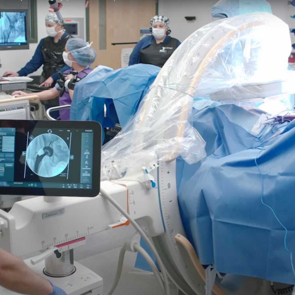 Orthopedic surgeon performing case