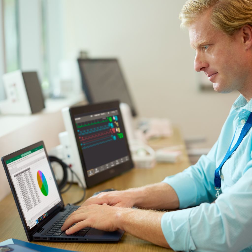 male clinician using cybersecurity tools
