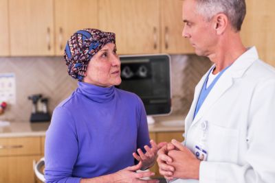 Doctor consulting patient during cardio oncology evaluation using Philips EPIQ CVx