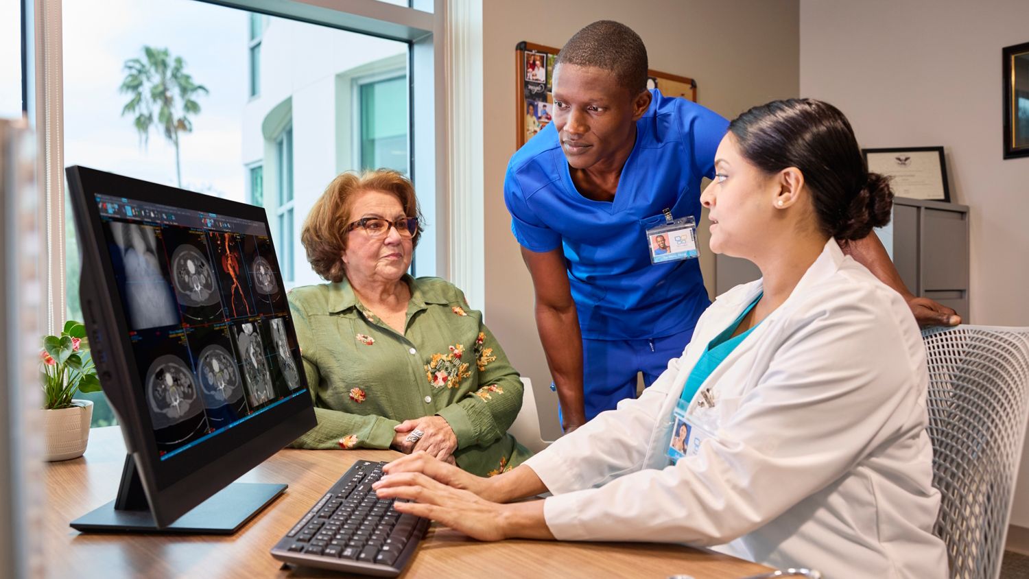 Doctors with Patient reviewing a case