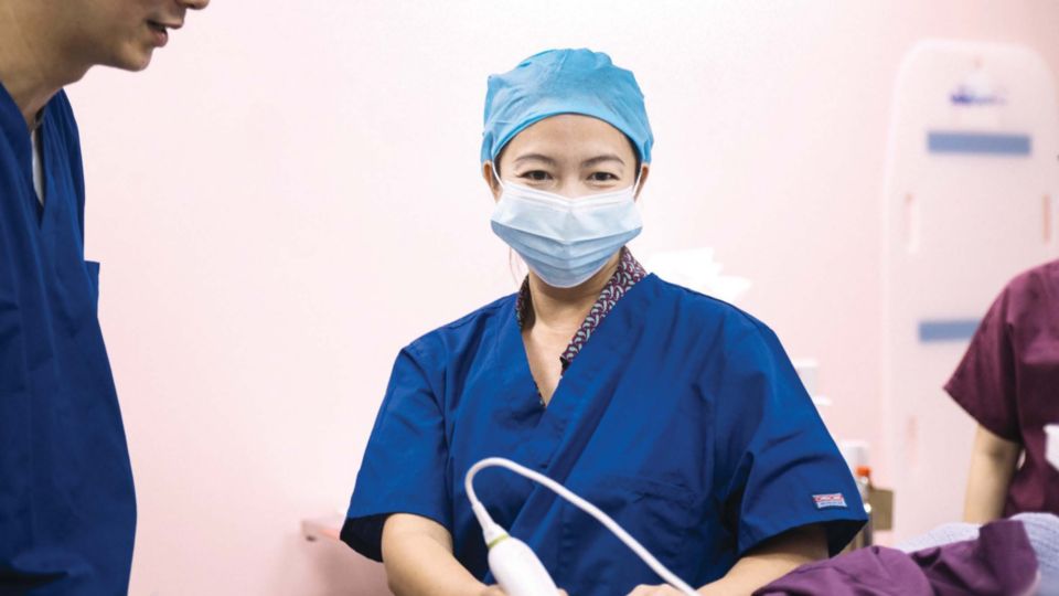 Dr. Felicia Tan uses the Lumify L12-4 linear transducer to complete a breast scan
