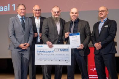 Award ceremony group photo with research funding award winner
